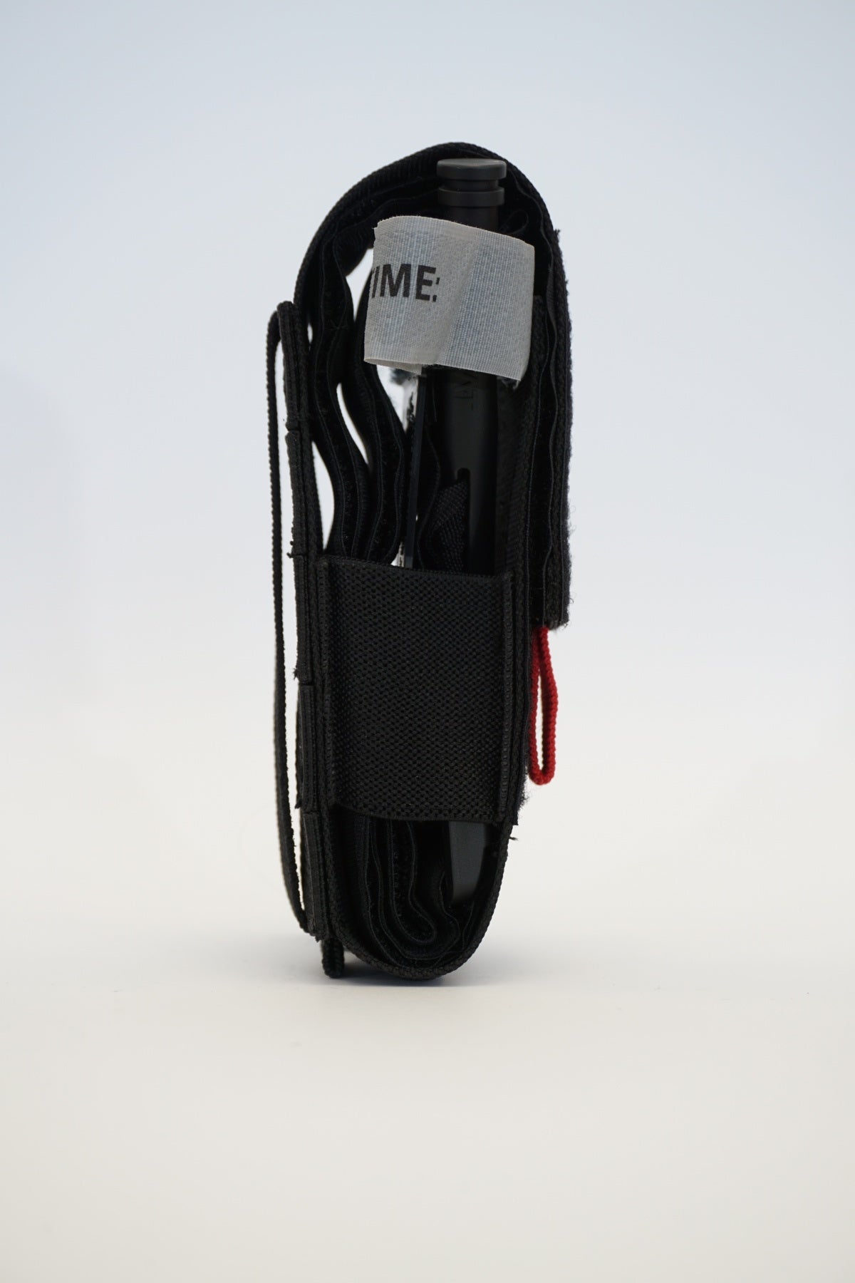 Universalus turniketo (TQ) dėklas